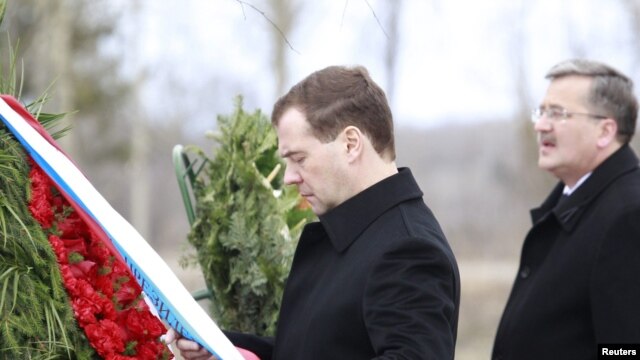 Russian President Dmitry Medvedev and his Polish counterpart, Bronislaw Komorowski, attend a commemoration ceremony in 2011 at the site of the 2010 plane crash near Smolensk.