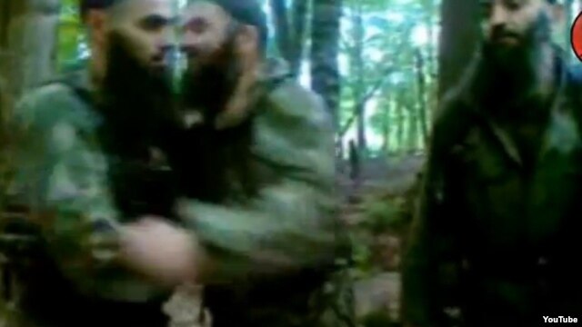 Khusayn Gakayev (left), Doku Umarov, and Aslanbek Vadalov (right) in a recent Youtube video