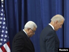 Palestinian President Mahmud Abbas (left) and U.S. Vice President Joe Biden after their joint news conference in the West Bank city of Ramallah