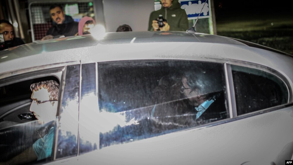 Cumhuriyet newspaper editor in chief Can Dundar is escorted by antiterror police to Silivri Prison after appearing in court in Istanbul in November 2015.