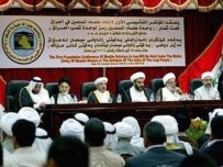 Iraqi Sunni and Shi'ite clerics at a joint conference in Baghdad on June 4 (AFP)