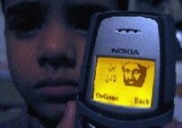 A boy in Pakistan shows a mobile phone with an image of Osama bin Laden (epa file photo)