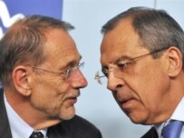 Russian Foreign Minister Sergei Lavrov (right) confers with Javier Solana, the EU's foreign policy chief, in Luxembourg on April 29 (AFP)