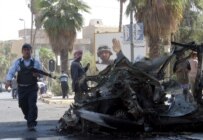 Police secure the site of a car bombing in Baghdad on September 4 (epa)