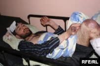 One of the injured demonstrators being treated for his wounds