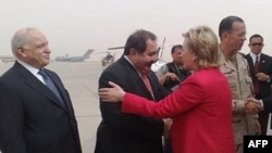 U.S. Secretary of State Hillary Clinton is greeted by Iraqi Foreign Minister Hoshyar Zebari on her arrival in Baghdad on April 25. (low quality image)
