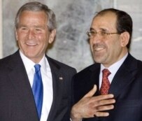 George Bush and Nuri al-Maliki in Baghdad on June 13 (AFP)