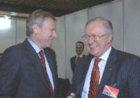 NATO Secretary-General Jaap de Hoop Scheffer (left) talking with Foreign Minister Tarasyuk in Brussels in April (courtesy photo)