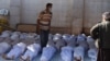 Iranian Officials Walk Fine Line On Syria Chemical Weapons