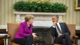 Германия канцлері Ангела Меркель (сол жақта) мен АҚШ президенті Барак Обама. Вашингтон, 9 ақпан 2015 жыл.