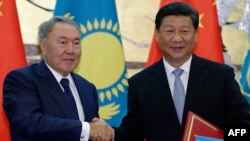 Қазақстан президенті Нұрсұлтан Назарбаев пен Қытай президенті Си Цзиньпин.