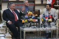 Iraqi President Talabani (left) with Iranian President Ahmadinejad in Tehran on November 27 (Fars)