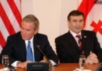 Presidents Bush (left) and Saakashvili during the May visit