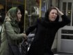 A day after the vote, a woman cries near Musavi\'s campaign headquarters in Tehran.