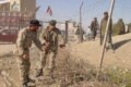 Pakistani troops fence part of the Afghan border near Chaman in January 2007