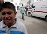 A boy weeps for his father who was killed when a suicide bomber targeted a Sunni mosque in Baghdad last month (epa)