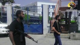 Libya -- A video grab reportedly shows forces of Ansar al-Sharia (Libya), which appears to be the group behind the September 11, 2012 attack on the US Consulate in Benghazi