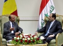Romanian President Traian Basescu (left) with Iraqi Prime Minister Nuri al-Maliki (epa)