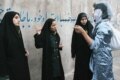 Police and Basij activists check women for proper dress in Tehran on April 22 (Fars)