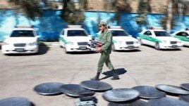 Iran – Satellite dishes removed from roofs and collected in a place among police cars in east Tehran, 21Feb2012 