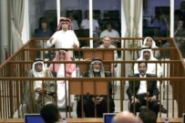 Saddam Hussein and his seven fellow defendants in court on May 15 (epa)
