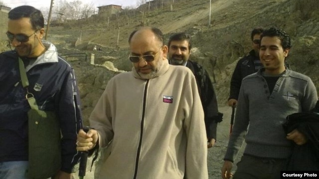 Blogger Mehdi Khazali (left) is believed to have served the past 40 days in a tiny cell.