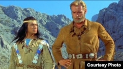 A scene from "Schatz im Silbersee" with Pierre Brice (left) as Apache chief Winnetou and Lex Barker as Old Shatterhand
