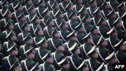 Young Russian men are required by law to serve in the army.