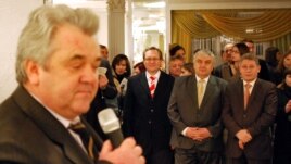 Anatol Plugaru (left, at a book launch in this file photo) is a former director of Moldova's intelligence service and an ex-parliament deputy.
