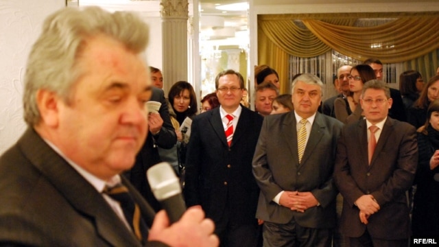 Anatol Plugaru (left, at a book launch in this file photo) is a former director of Moldova's intelligence service and an ex-parliament deputy.