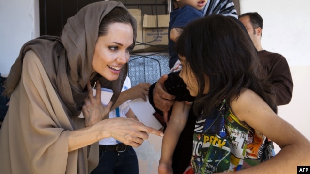 UNHCR special envoy Angelina Jolie meets with Syrian children refugees in the eastern Lebanon's Bekaa Valley near the border with Syria, 12Sep2012