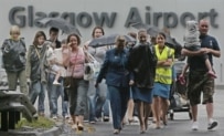 People fleeing the Glasgow Airport terminal after the June 30 explosion (AFP)