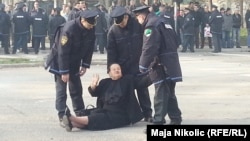 Bosnian police arrest a protester in Tuzla on February 5.