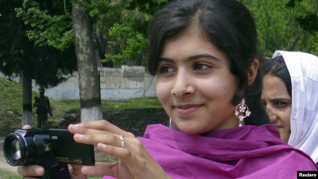 Malala Yousafzai, the 14-year-old schoolgirl targeted in the October 9 gun attack, is seen in Swat Valley in an undated photo.