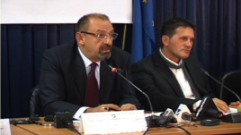 Dino Asanaj (left) was director of the board of the Kosovo Privatization Agency