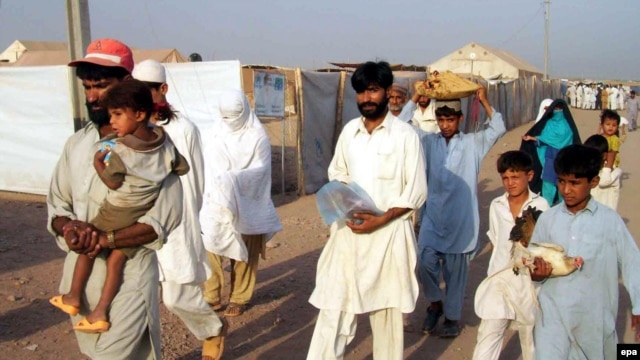 Pakistani refugees prepare to go back to the Swat region.
