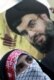 An Iranian woman at a rally in support of Lebanon and the leader of the Hizballah militia, Hassan Nasrallah (AFP)