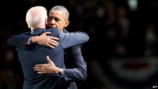 Reelected U.S. President Barack Obama and Vice President Joe Biden embrace after his victory speech on election night at McCormick Place in Chicago.