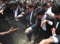 Deposed Chief Justice Iftikhar Muhammad Chaudhry (center) marches with lawyers (AFP)