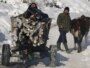 Kosovo -- A villager drives a mini tractor carrying wood in the village of Jezerc, 31Jan2012
