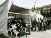 Iraqi refugees registering in Damsacus in April (epa)