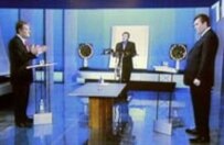 Yushchenko (left) and Yanukovych (right) square off during yesterday's televised debate.
