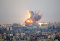 Smoke and fire rise from buildings in the southern suburbs of Beirut afte Israeli air strikes (epa)