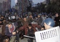Police move in on demonstrators yesterday (AFP)