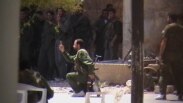 Syria -- A handout picture released by Shaam News Network allegedly shows Syrian armed forces as they storm al-Hurriya square in Daraa, 20Apr2012