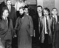 (Front row, left to right) Government delegation head Shukurjon Zuhurov, Islamic Renaissance Party leader Said Abdullo Nuri, opposition representative Otakhom Latifi at the second round of peace talks in Islamabad in 1995 (RFE/RL)