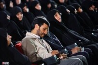 Iranian President Mahmud Ahmadinejad sits amid an audience of women (file photo) (Fars)