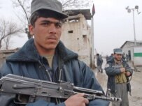 An Afghan soldier secures the site of today's bombing (epa)