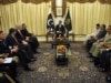 Militants Grab Headlines -- Again -- As Clinton Visits Pakistan