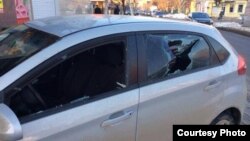 Igor Kharchenko was arrested again under the pretext that his car had been "involved in a crime," shortly after three masked men had smashed in the front and back windows of the vehicle.